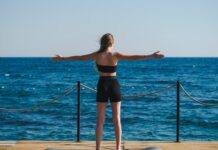여름철 건강관리, 기본 수칙만 잘 지켜도 건강하게 보낼 수 있다 a person doing yoga on a dock