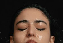 “스트레스가 얼굴로 드러난다?” 직장인 3대 피부 트러블과 관리법 a woman with her eyes closed covered in water