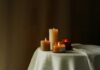 일상 속 대체요법, 건강을 위한 새로운 선택지로 주목받다 three lit candles sitting on a white table cloth