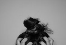 “스트레스, 일상 속 작은 변화로 다스린다” a woman covering her face with her hands