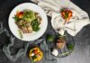 “나만의 균형 식단, 어렵지 않아요…최근 트렌드에서 배우는 똑똑한 실천법” a white plate topped with meat and veggies